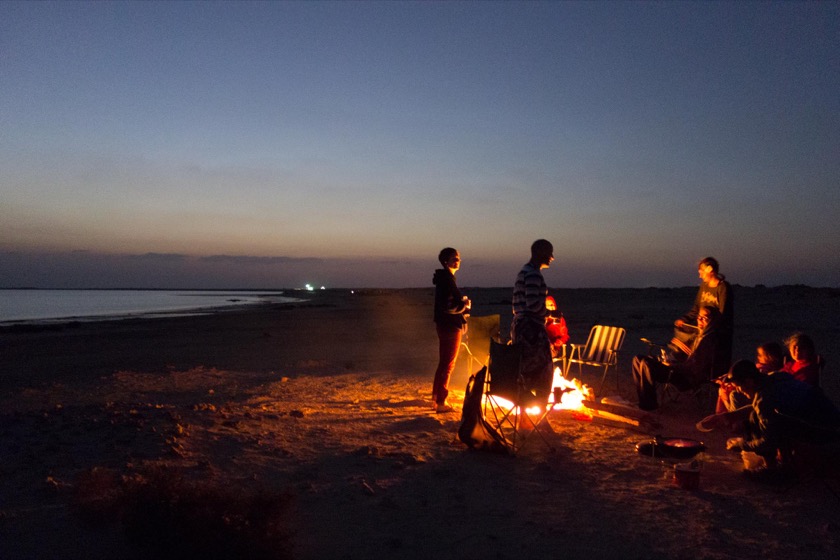 We collected some scrap wood near our house and brought it out to make a campfire.